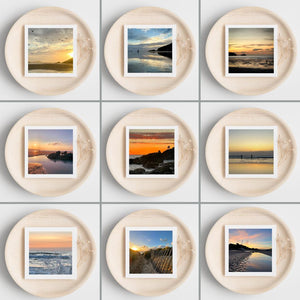 Nine circular frames with scenic images of beach landscapes at sunset or sunrise on a white background