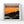 Framed artwork of a sunset over rocks with two silhouettes fishing, on a white wall.